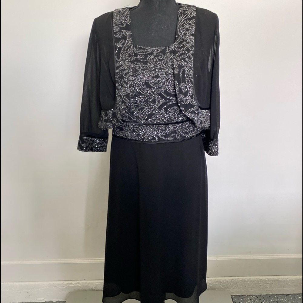 Black with silver dressy dress. Worn twice